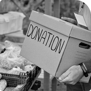 Hands holding a donation sign